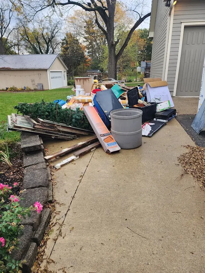 Dumpster being loaded with debris for 30 Yard Dumpster Rental in Lebanon